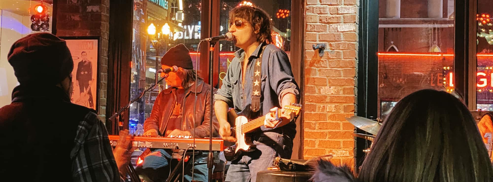 bar singer on guitar in Sacramento