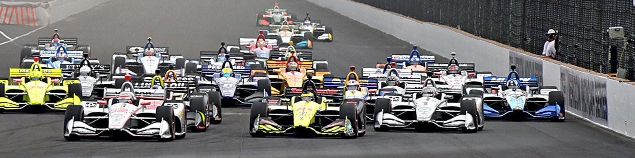 indy cars racing to through the start line Sacramento